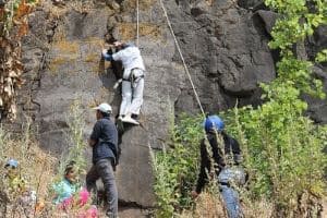 rock climbing activities during camping in kanatal